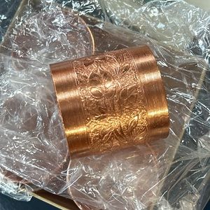 Vintage Coppercraft set of 4 copper napkin rings in box.